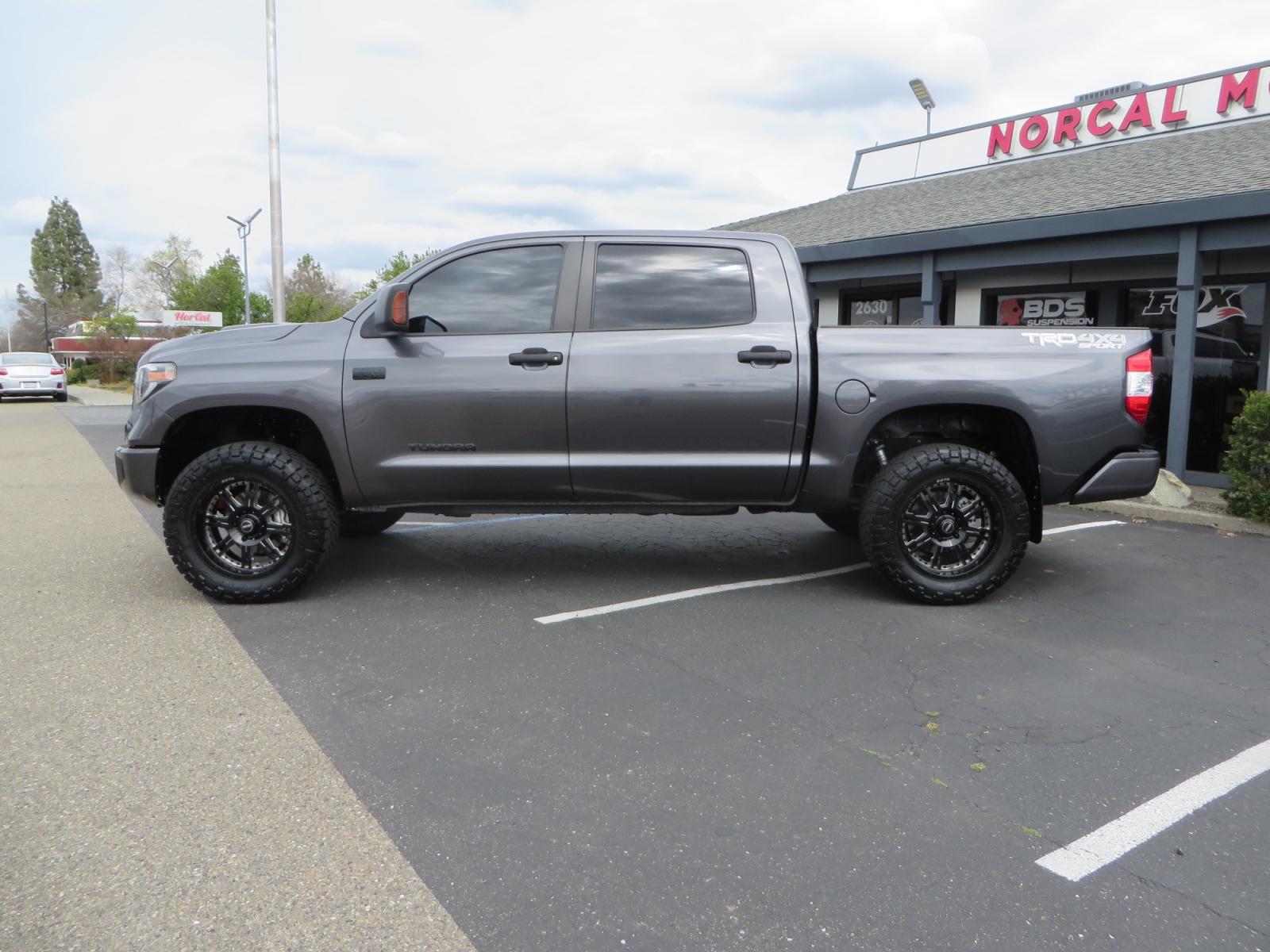 2021 CHARCOAL /GREY Toyota Tundra SR5 (5TFDY5F16MX) with an 5.7L V8 OHV 16V engine, automatic transmission, located at 2630 Grass Valley Highway, Auburn, CA, 95603, (530) 508-5100, 38.937893, -121.095482 - Features a Zone Offroad level kit, 20" SOTA wheels, 35" Nitto Ridge Grappler tires, Fox rear shocks, Air bags, front and rear TRD sway bars, and Window tint. - Photo #7